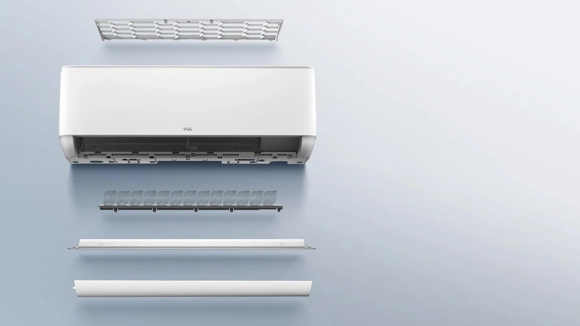 Disassembled air conditioner parts including front panel, filter, and cover, displayed on a light background.