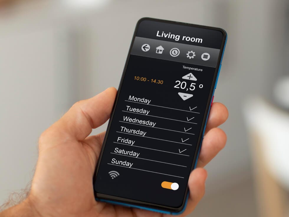 Smartphone screen showing a home automation app with options to control the living room temperature, currently set at 20.5°C, and a weekly schedule. Wi-Fi icon is switched on.